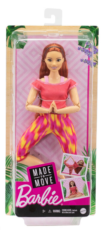 Poupée Barbie Fitness aux formes athlétiques et aux longs cheveux roux et raides en tenue de sport, avec 22 points d'articulation