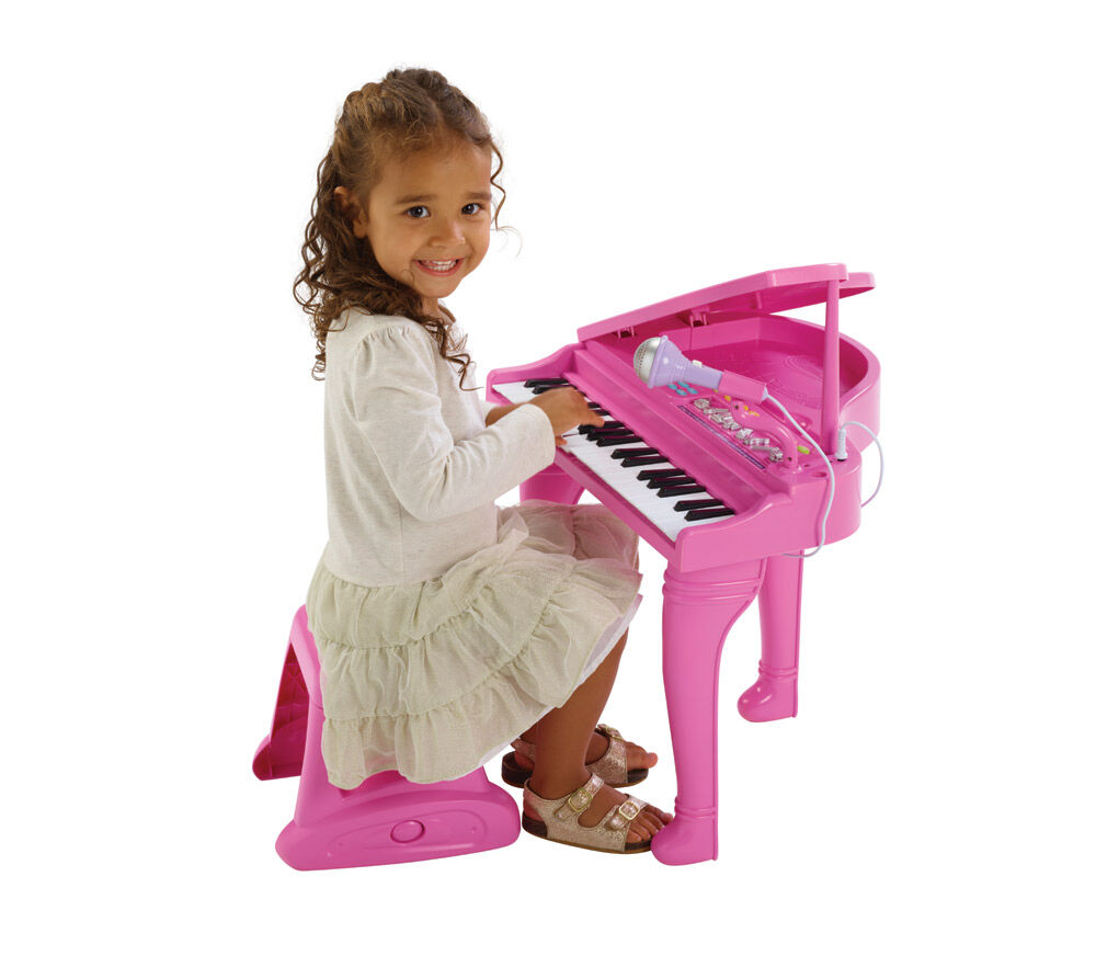 childs pink baby grand piano