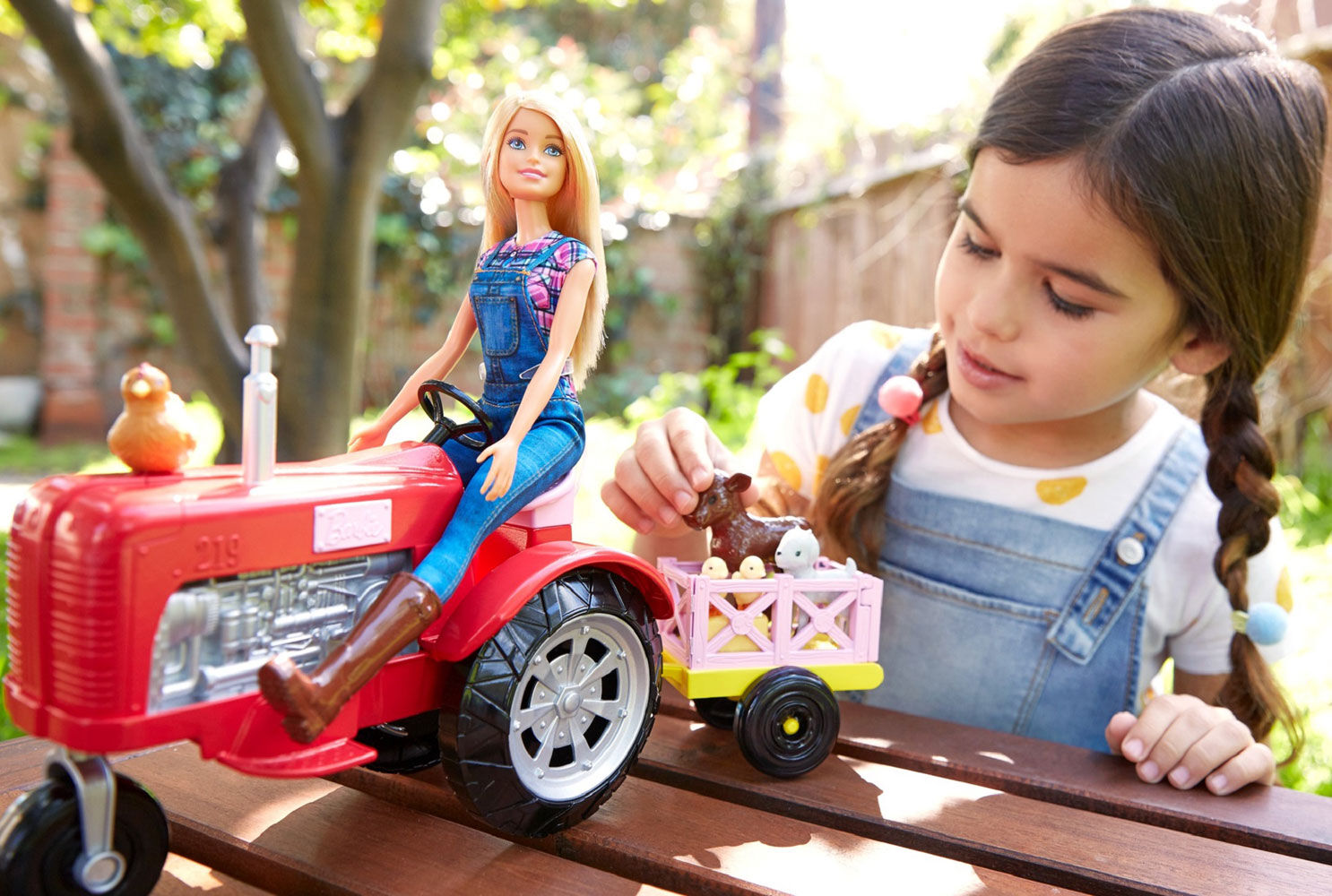 barbie doll and tractor